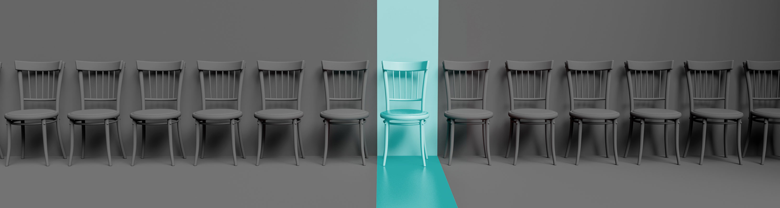 Chairs in a row with one highlighted